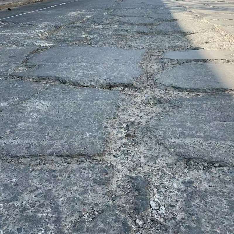 二道江路面起砂露石子修补料